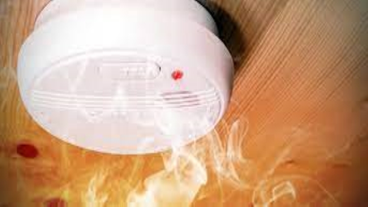 How will a smoke detector help you reduce fire risk?